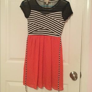 Black top coral bottom kids dress.